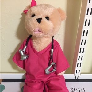 Nurse bear with battery pack, singing ability